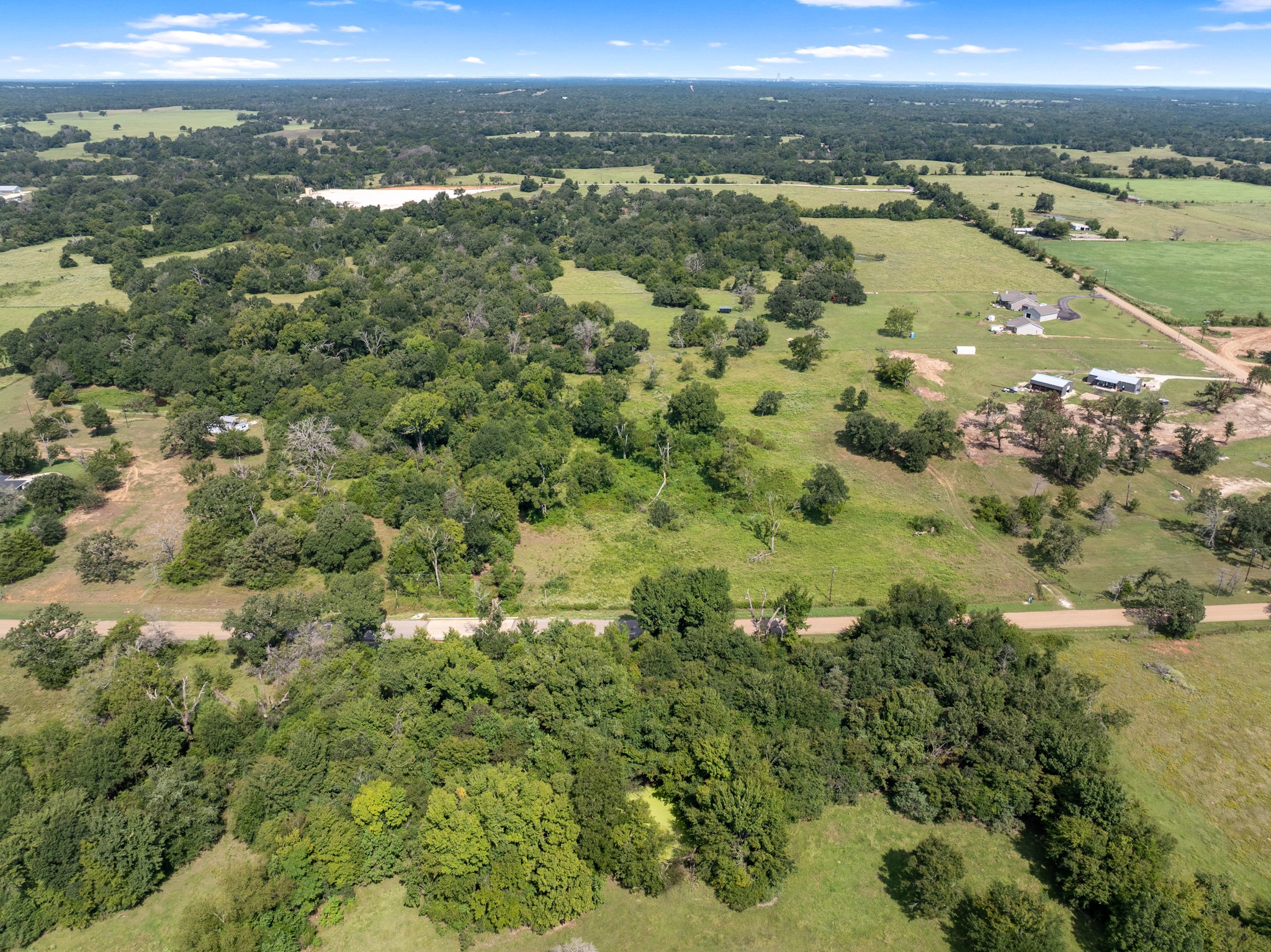 Tbd Cazey Loop Franklin, TX 77856 - Photo 7 of 20 a view of a city with an ocean