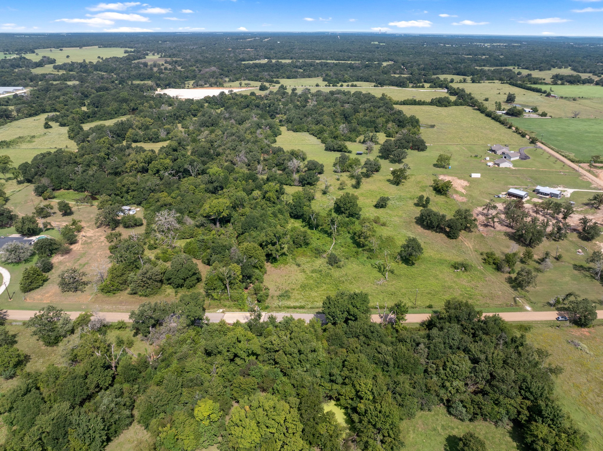 Tbd Cazey Loop Franklin, TX 77856 - Photo 10 of 20 a view of a city with ocean view