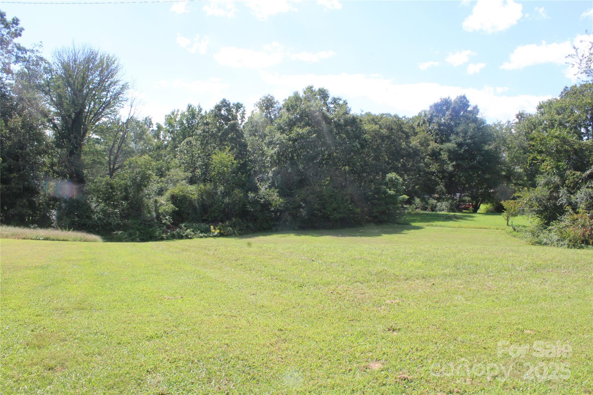 a view of an outdoor space and a yard