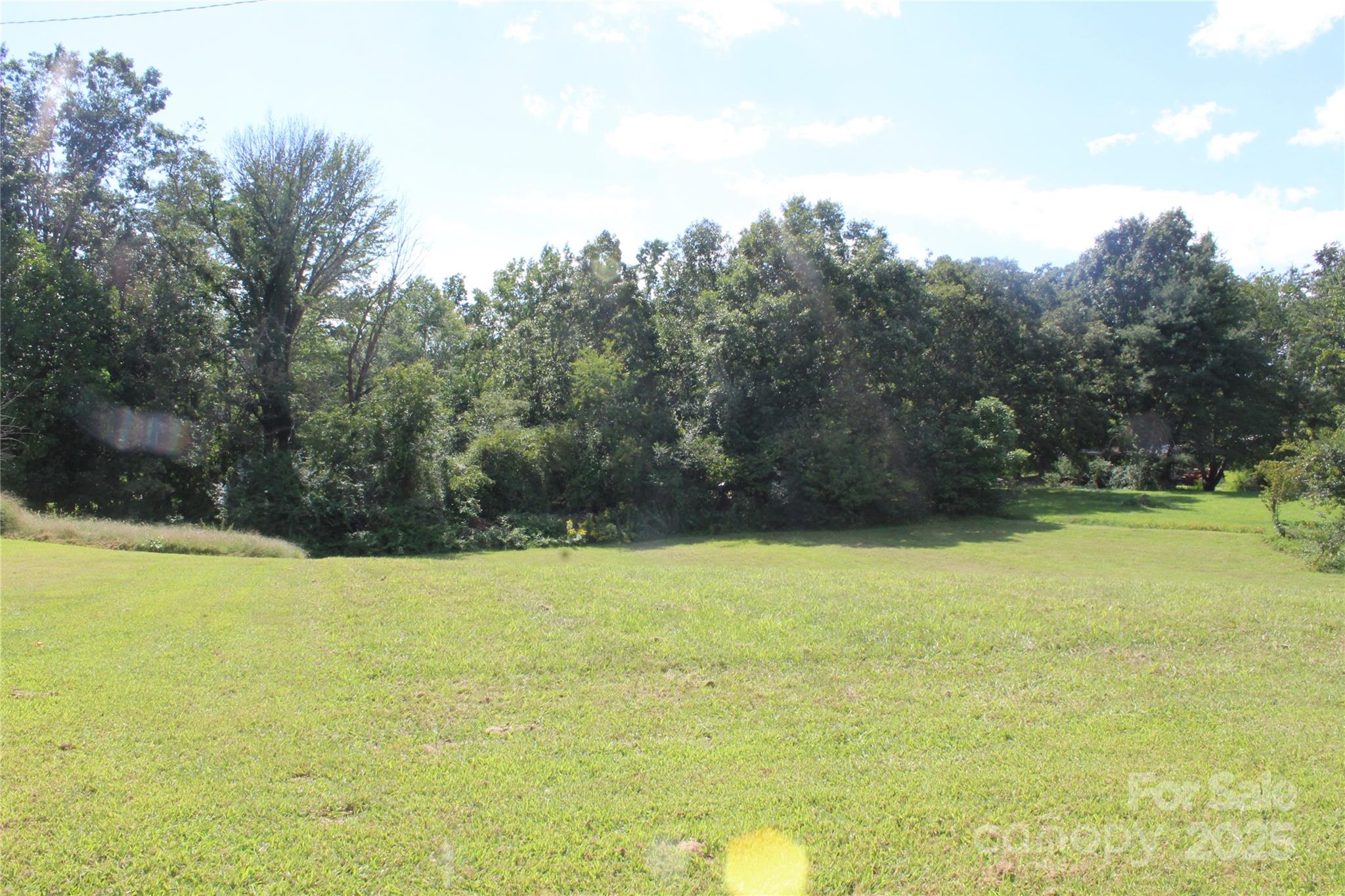 5930 Fisher Davis Road Morganton, NC 28655 - Photo 3 of 6 a view of a swimming pool with an outdoor space