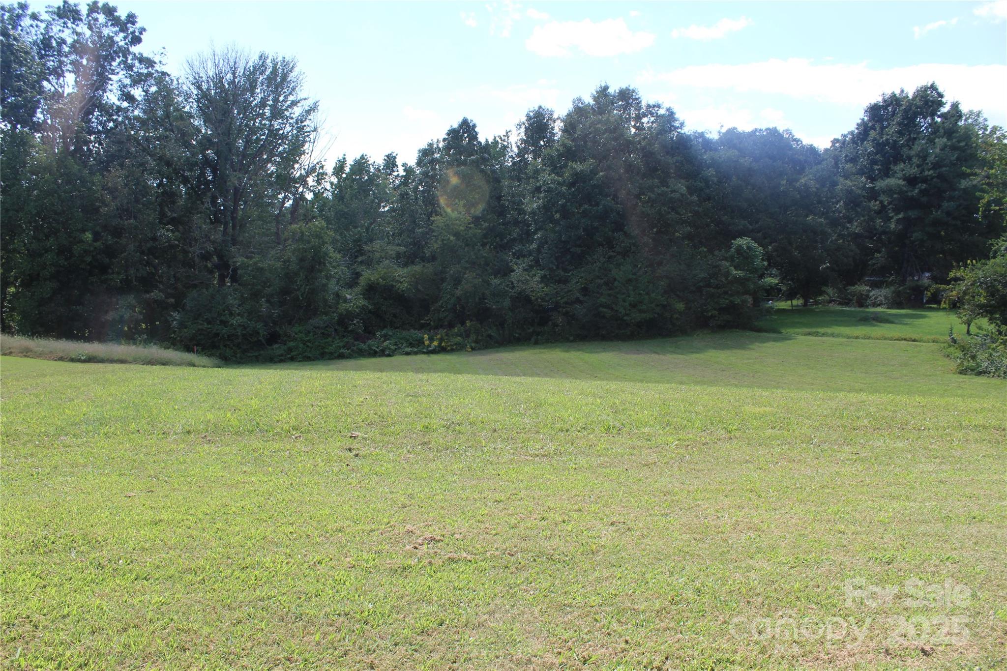 5930 Fisher Davis Road Morganton, NC 28655 - Photo 4 of 6 a view of a tennis court