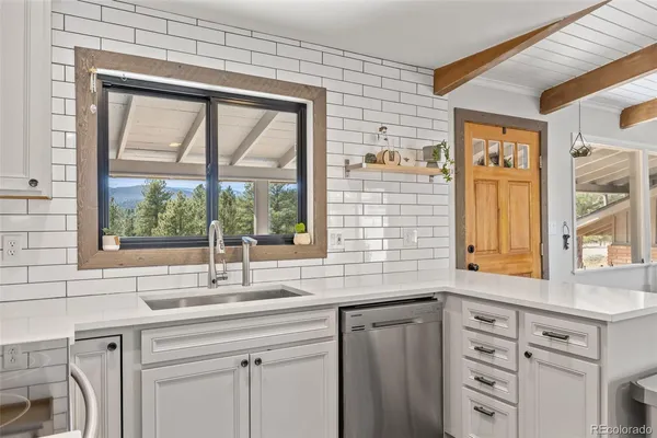 $995,000 | 3886 Ponderosa Drive, Evergreen, CO 80439