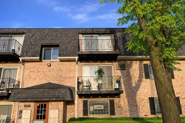 a front view of a house with balcony