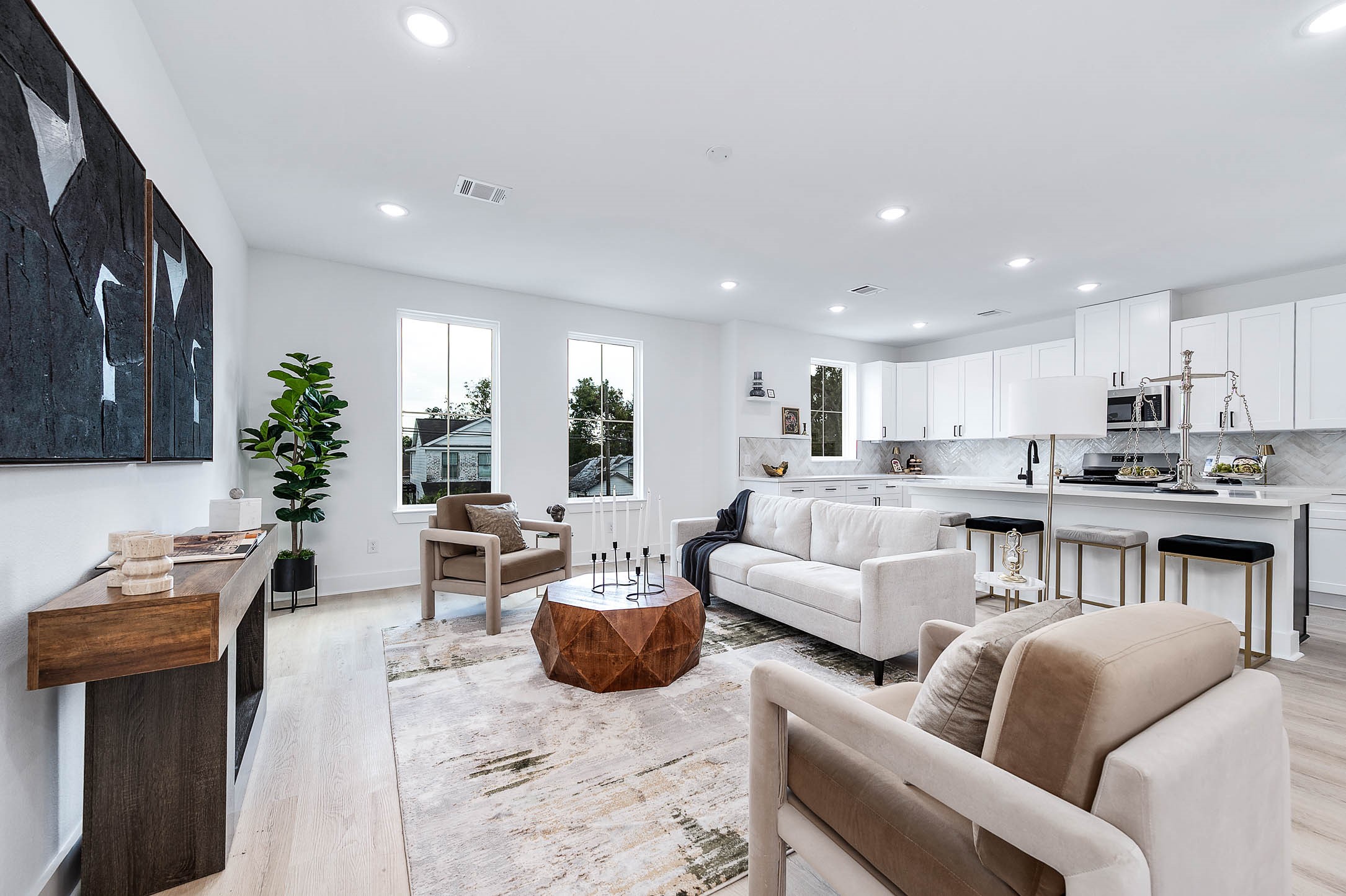 1515 Euel Street Houston, TX 77009 - Photo 10 of 34 Spacious living room designed for comfort, featuring generous seating space and seamless flow into the kitchen and dining areas.