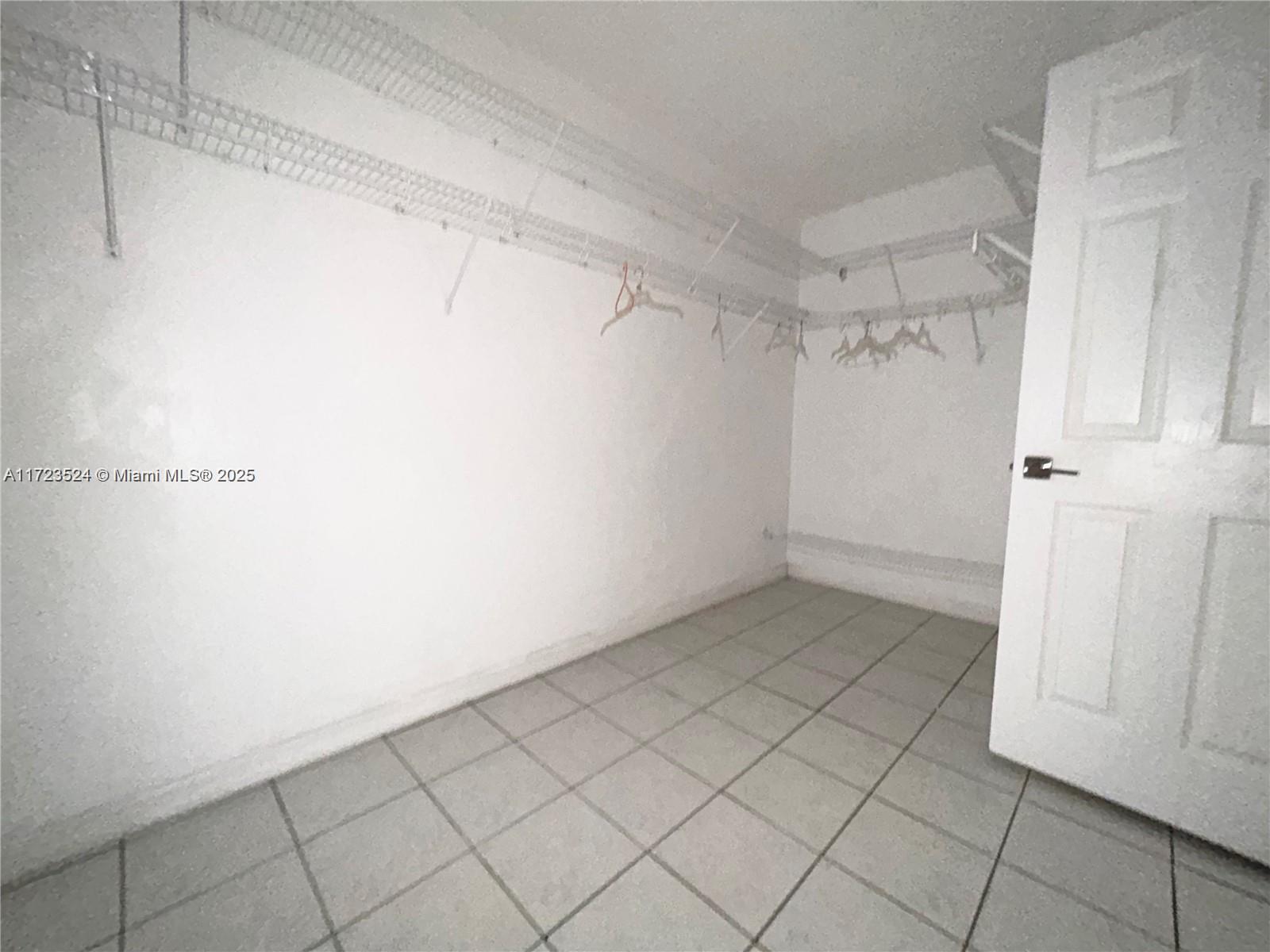 9227 Highway 80 Moore Haven, FL 33471 - Photo 18 of 20 a view of an empty walk in closet