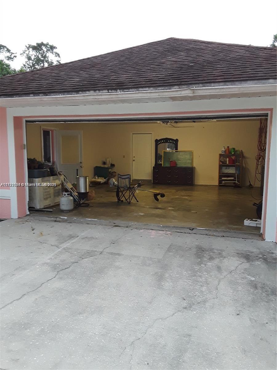 9227 Highway 80 Moore Haven, FL 33471 - Photo 6 of 20 a view of front door