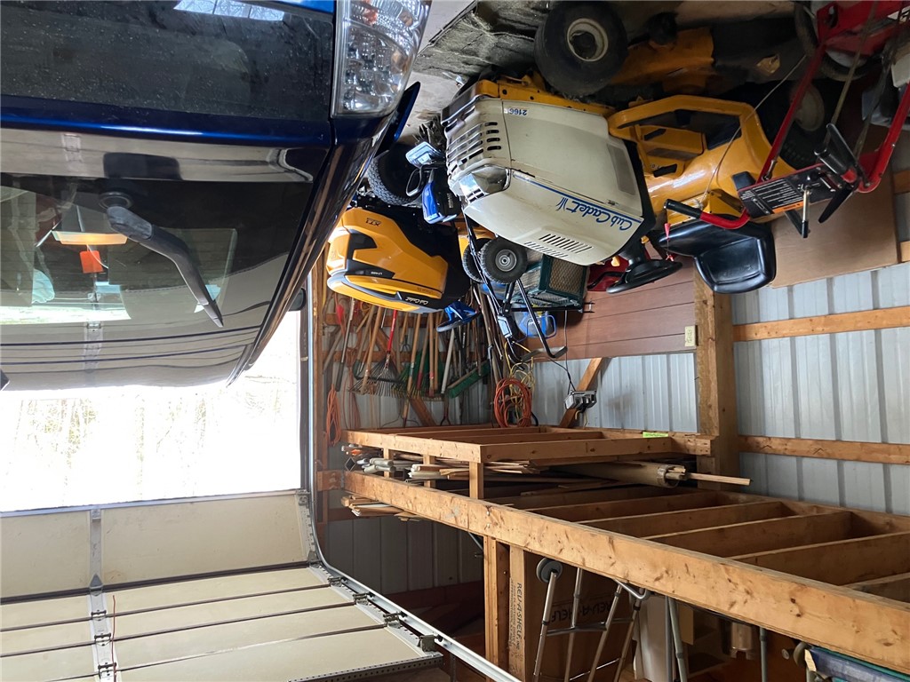2066 Tolbert Road Hamilton, OH 45011 - Photo 37 of 63 This spacious garage offers ample storage solutions and convenient access.