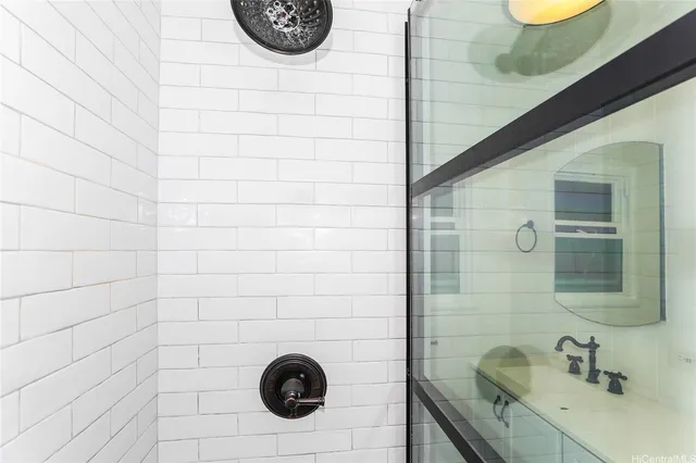 a bathroom with a sink and mirror