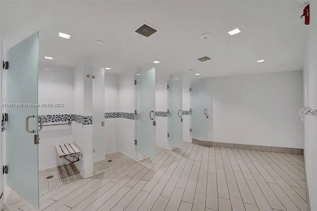 a view of swimming pool with outdoor seating and city view