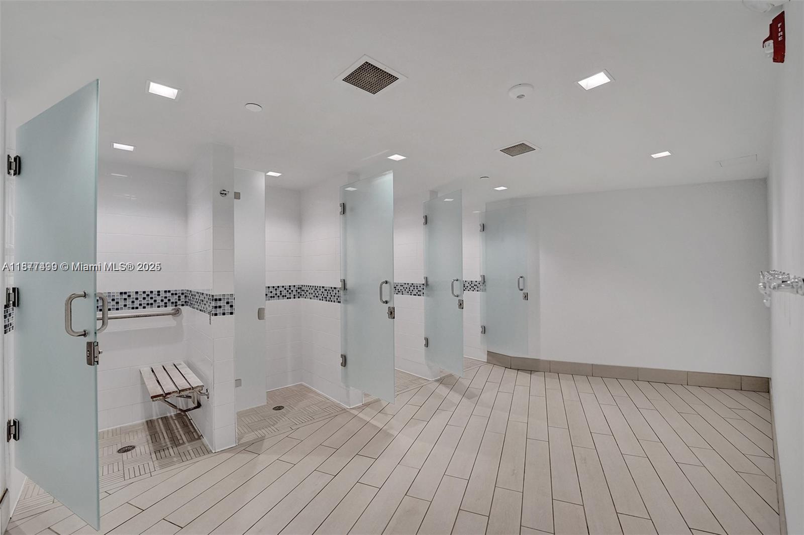 500 Three Islands Boulevard, Unit 320 Hallandale Beach, FL 33009 - Photo 23 of 27 a view of a hallway with wooden floor