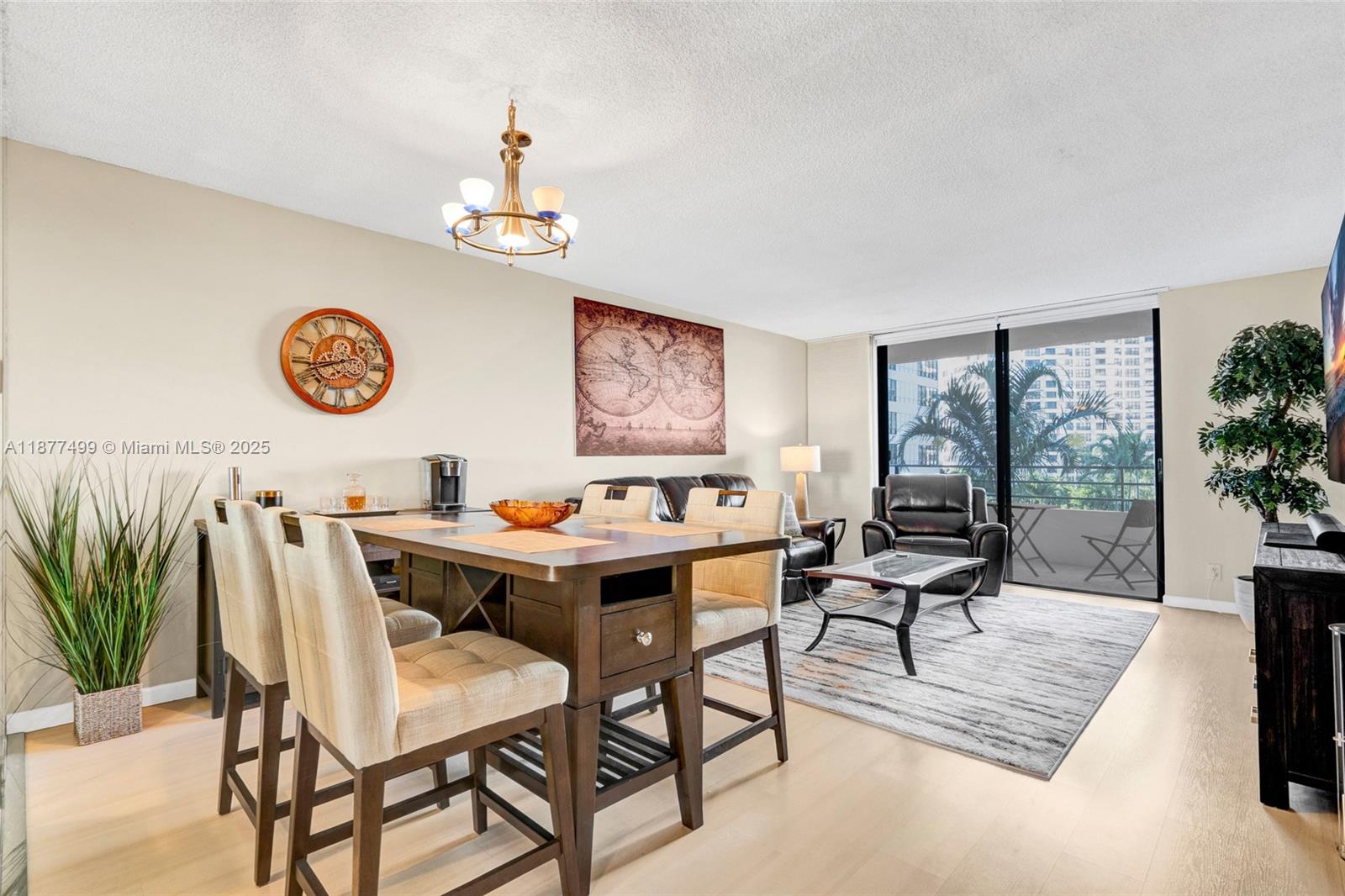 500 Three Islands Boulevard, Unit 320 Hallandale Beach, FL 33009 - Photo 3 of 27 a view of a livingroom with furniture and window