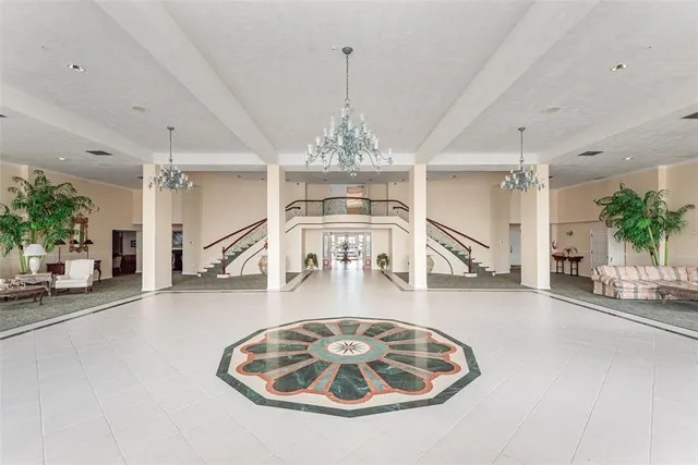 a view of a swimming pool with a patio