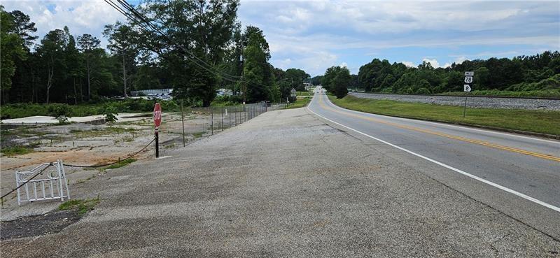 14971 Veterans Memorial Highway Villa Rica, GA 30180 - Photo 12 of 17 a view of a road with a yard