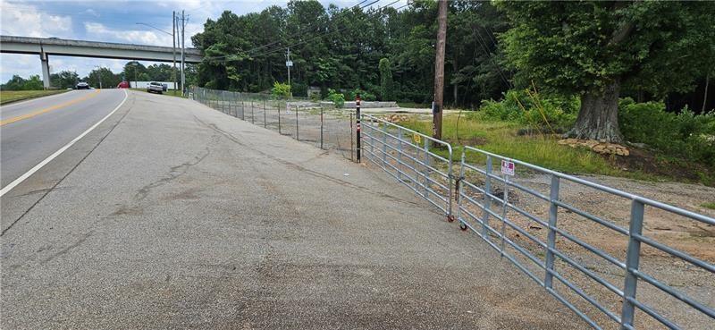 14971 Veterans Memorial Highway Villa Rica, GA 30180 - Photo 14 of 17 a view of a street with large trees