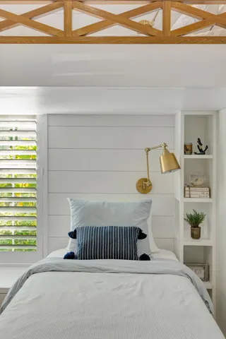 a living room with fireplace furniture and a flat screen tv