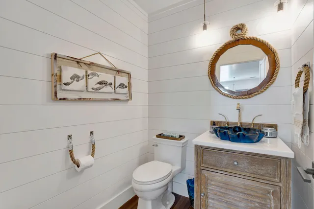 a bathroom with a granite countertop sink mirror and double