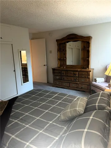 a view of a hallway with a living room