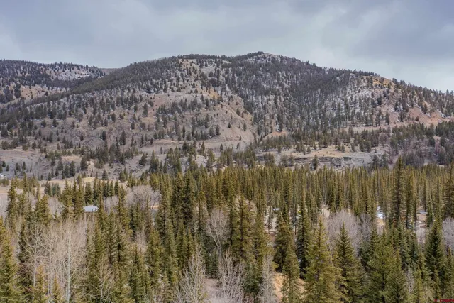 a view of a lake with mountains in the background