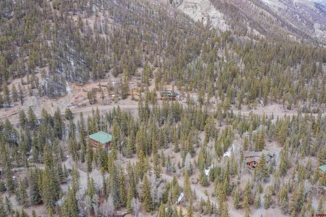 a view of mountain with mountains in the background