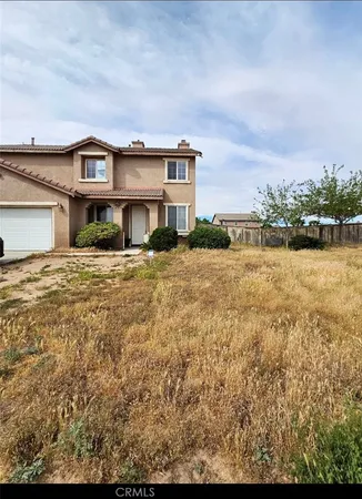 front view of house with a yard