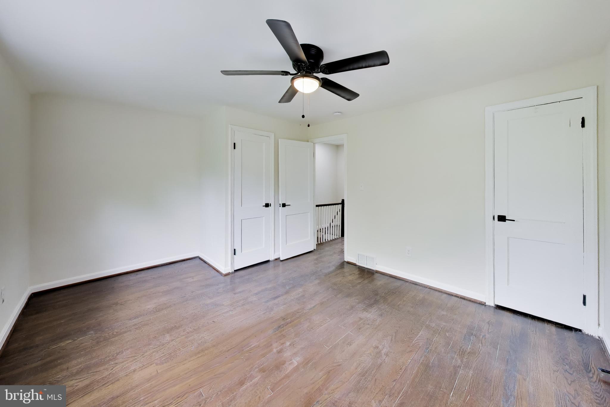 186 Forrester Street Southwest Washington, DC 20032 - Photo 16 of 32 a view of an empty room and wooden floor