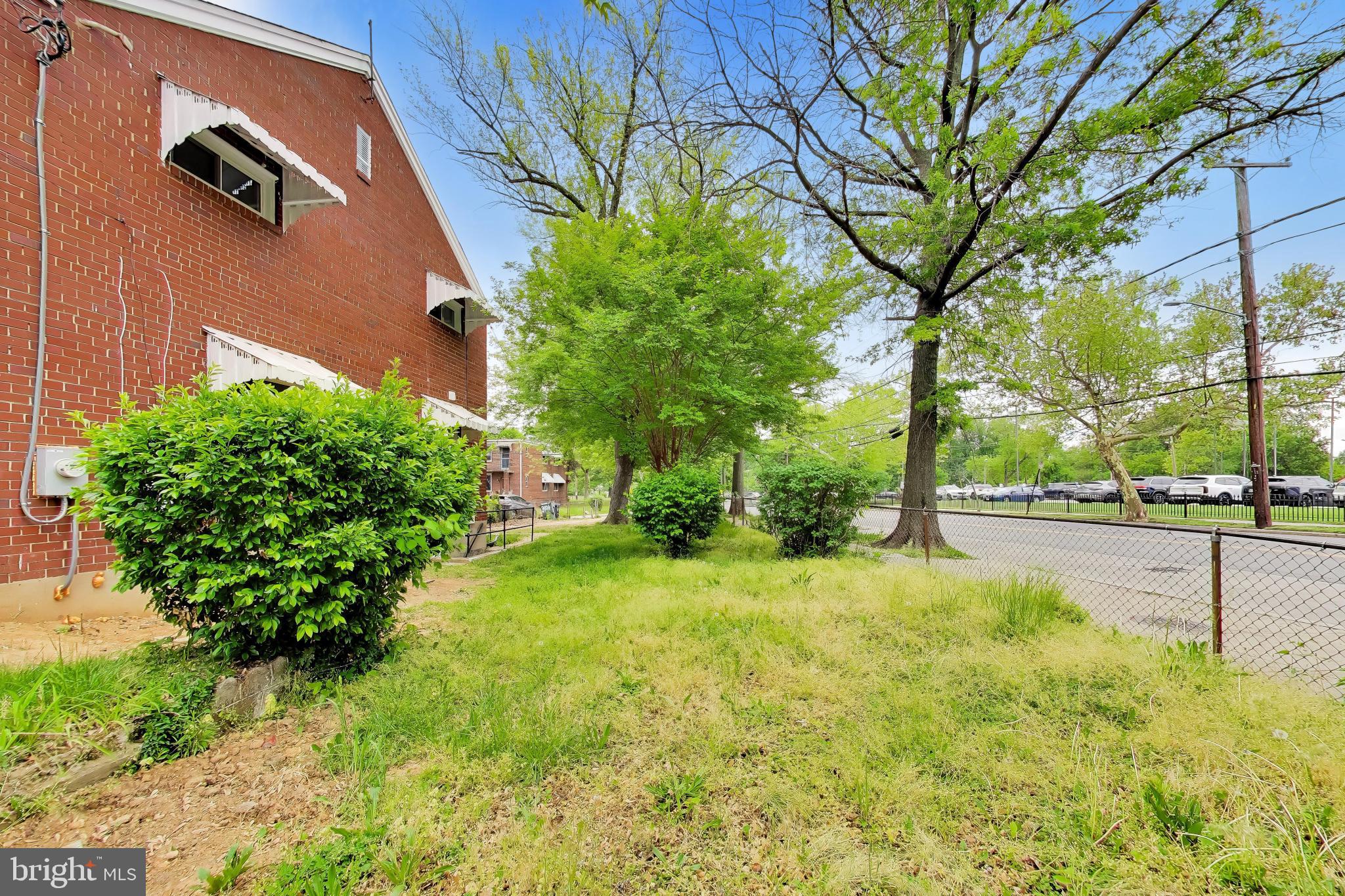 186 Forrester Street Southwest Washington, DC 20032 - Photo 30 of 32 a view of backyard with tree