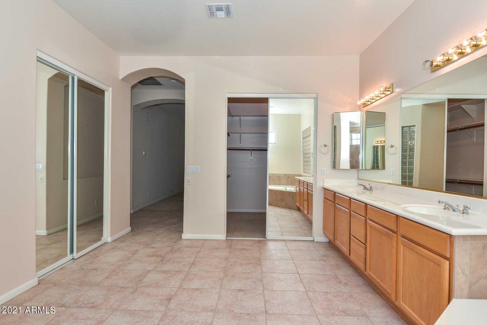 13437 West Coronado Road Goodyear, AZ 85395 - Photo 31 of 52 Master Bath-Closets