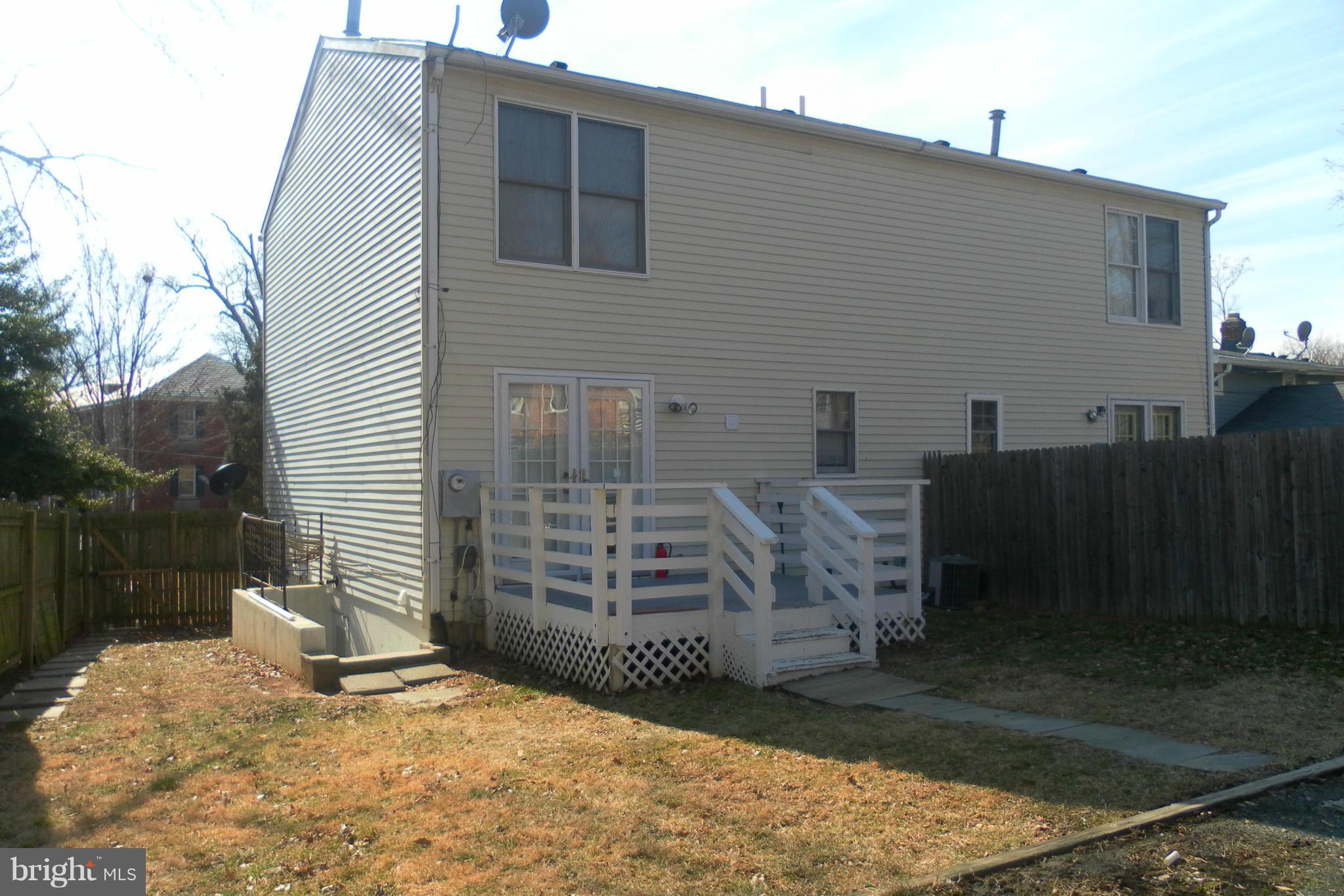 108 East Glebe Road Alexandria, VA 22305 - Photo 12 of 14 a view of a house with a yard
