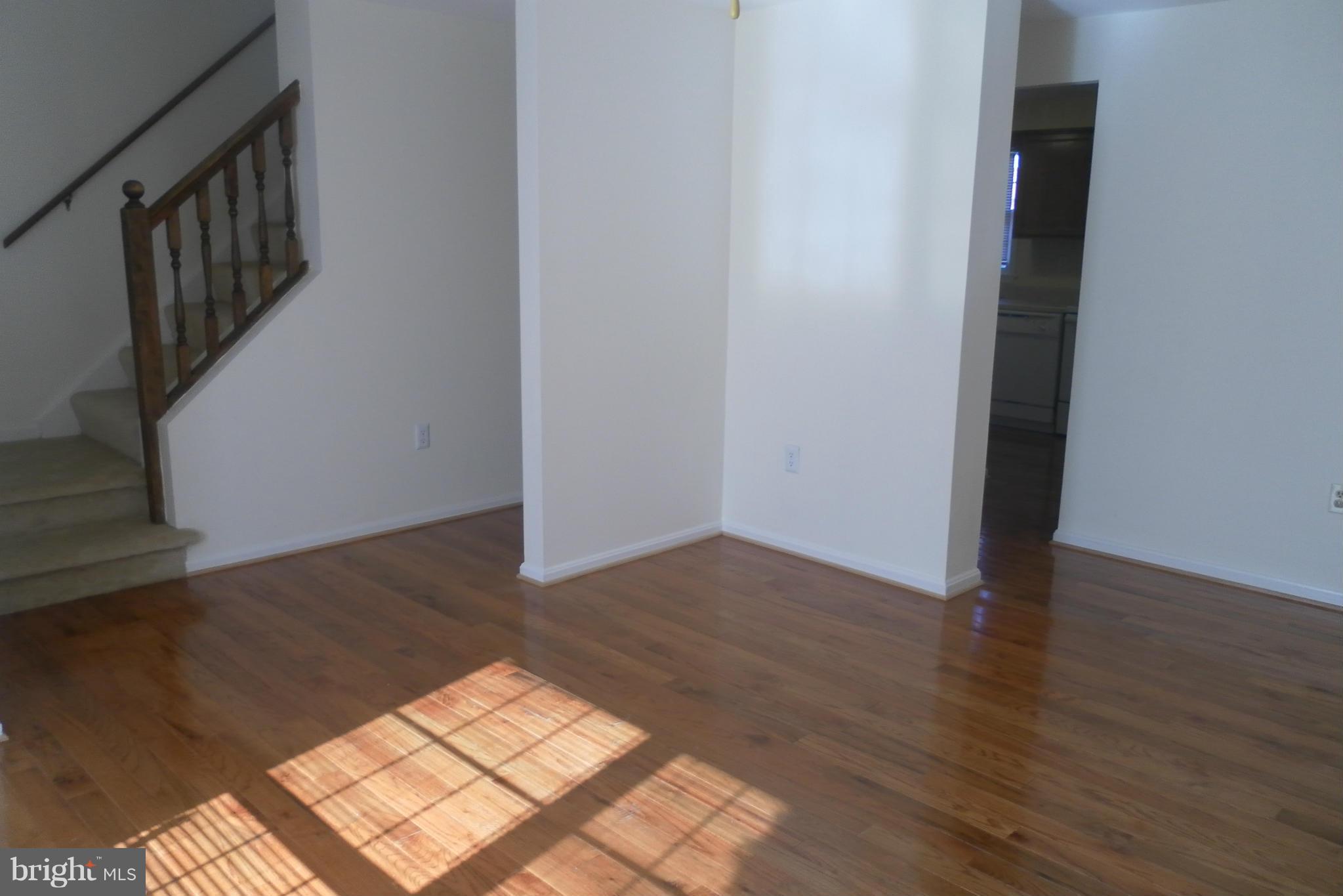 108 East Glebe Road Alexandria, VA 22305 - Photo 4 of 14 wooden floor in a hall with wooden floor