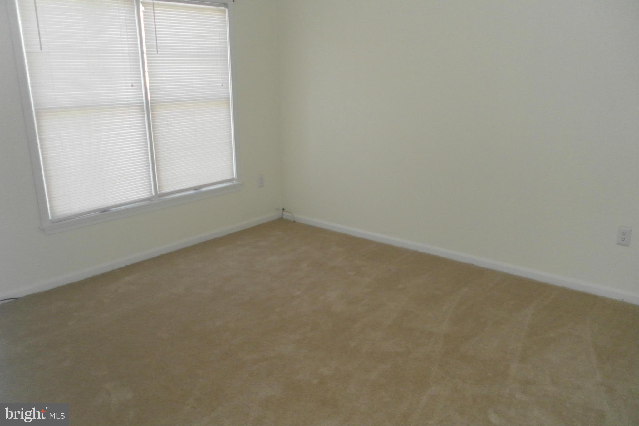 108 East Glebe Road Alexandria, VA 22305 - Photo 10 of 14 an empty room with a window