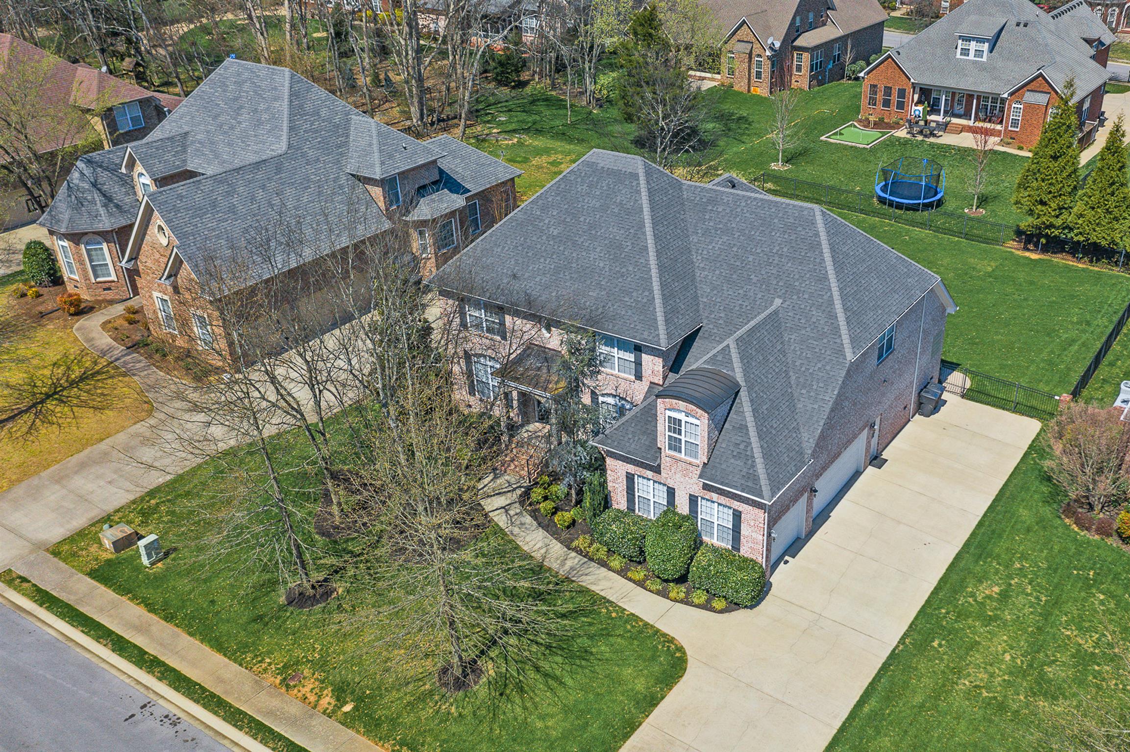 5332 Sherrington Road Murfreesboro, TN 37128 - Photo 1 of 29 Storybook custom home located on a premier street in Berkshire with beautiful treescape.