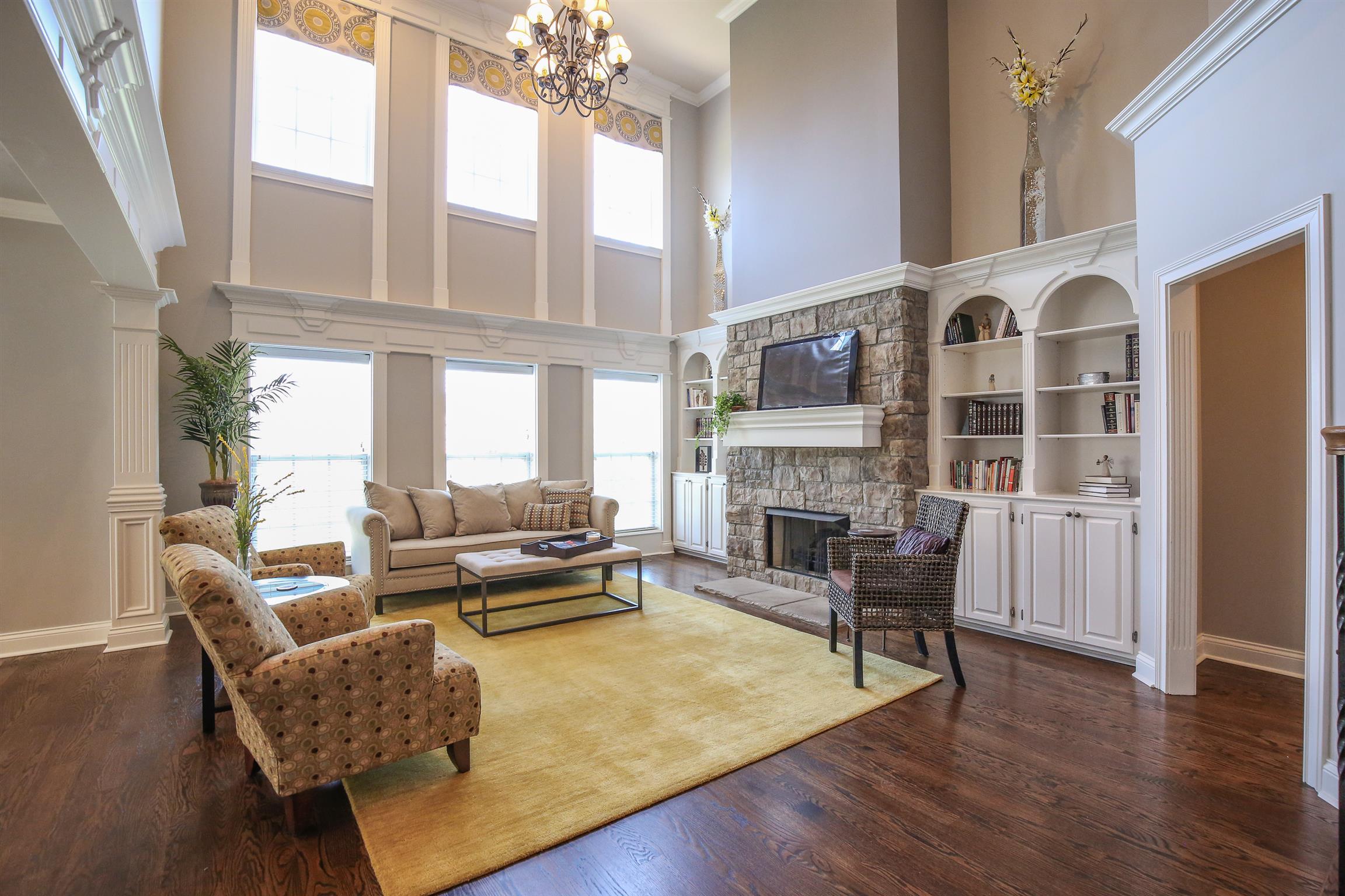 5332 Sherrington Road Murfreesboro, TN 37128 - Photo 11 of 29 Custom built-ins and two story living room with woodwork