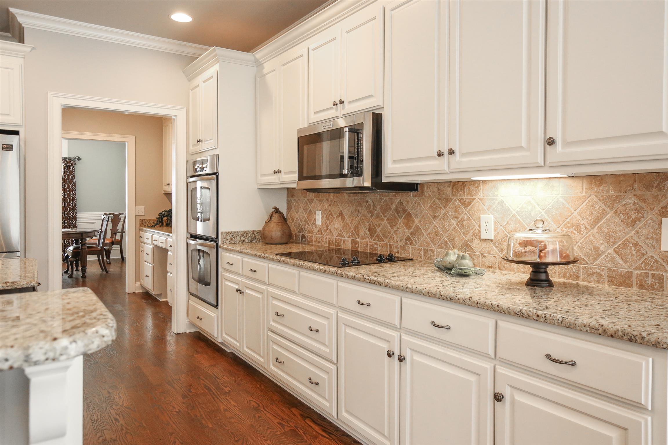 5332 Sherrington Road Murfreesboro, TN 37128 - Photo 9 of 29 Pull-out drawers below the smooth top stove convenient for pots and pans