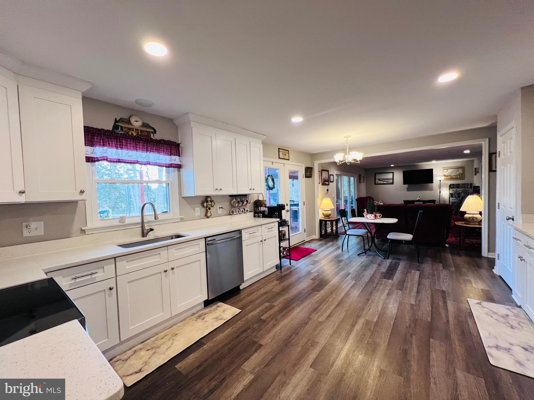 436 Thompson Circle Colonial Beach, VA 22443 - Photo 14 of 40 a living room with furniture and a wooden floor