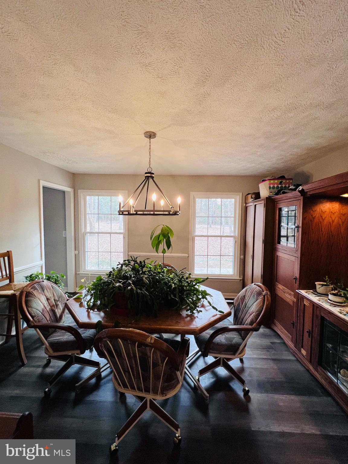 436 Thompson Circle Colonial Beach, VA 22443 - Photo 20 of 40 a living room with furniture a window and a flat screen tv