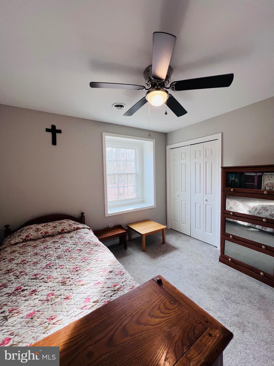 436 Thompson Circle Colonial Beach, VA 22443 - Photo 27 of 40 a bedroom with a bed and a window
