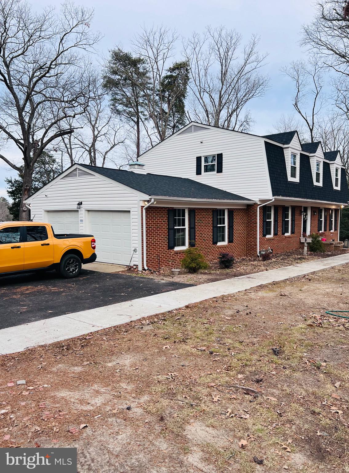 436 Thompson Circle Colonial Beach, VA 22443 - Photo 38 of 40 a front view of a building with parking space