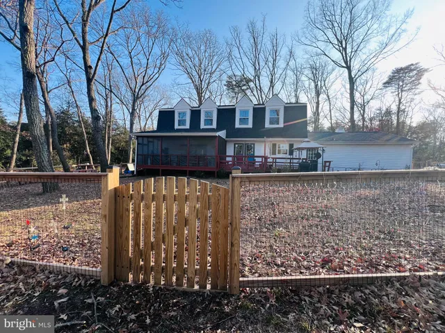a view of a yard covered with snow