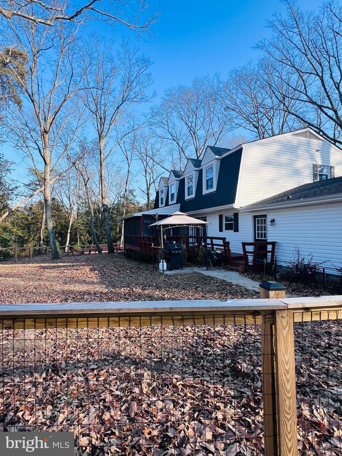 436 Thompson Circle Colonial Beach, VA 22443 - Photo 5 of 40 a view of a house with a yard
