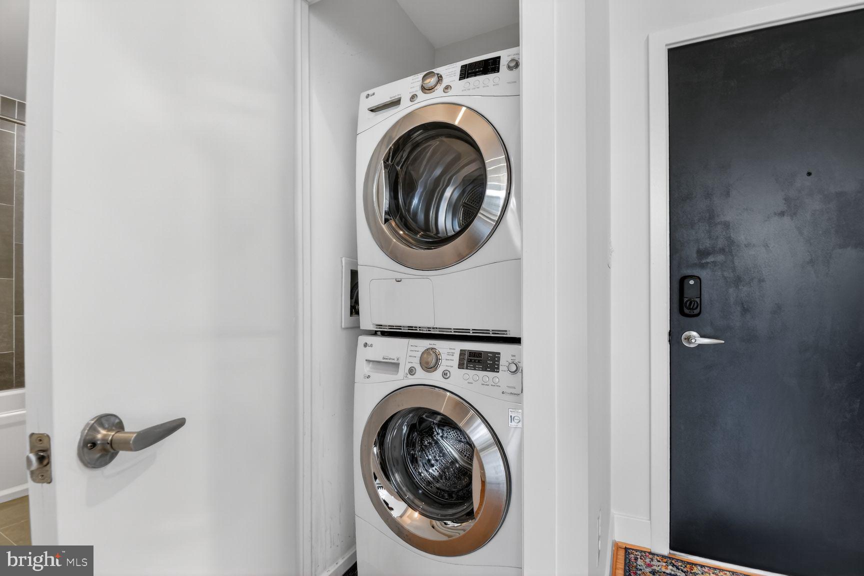 1443 Chapin Street Northwest, Unit 403 Washington, DC 20009 - Photo 18 of 24 a utility room with dryer and washer
