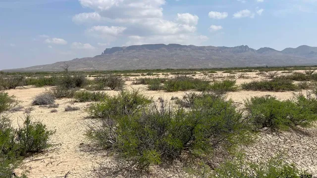 a view of lake with mountain