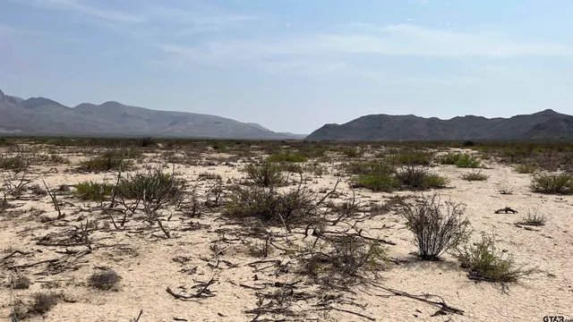 a view of lake and mountain