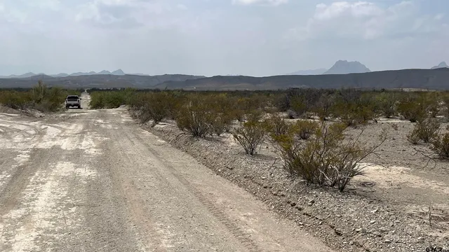 a view of lake with mountain