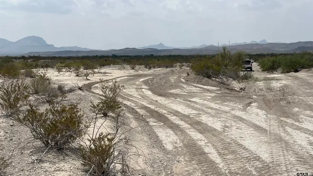 a view of lake with mountain