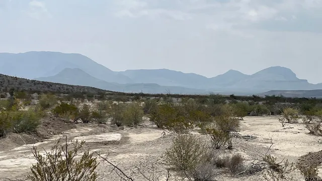 a view of lake with mountain