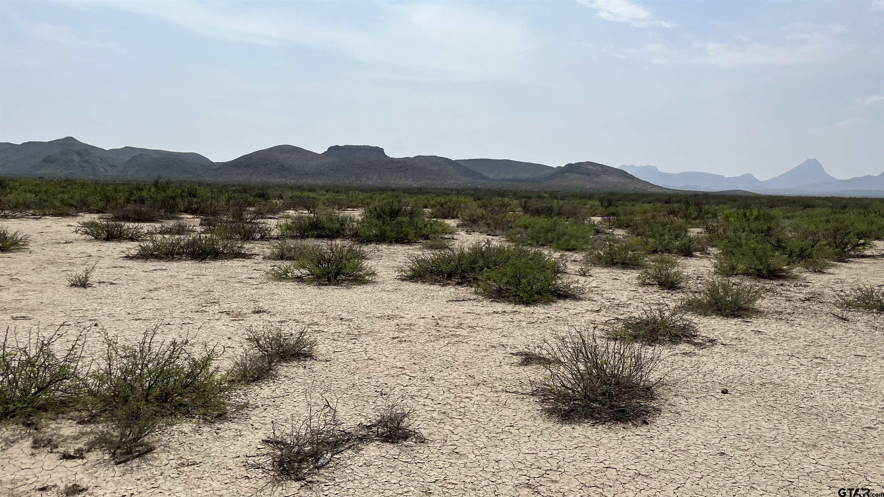19486 Avid Alpine, TX 79830 - Photo 7 of 20 a view of a lake with a mountain