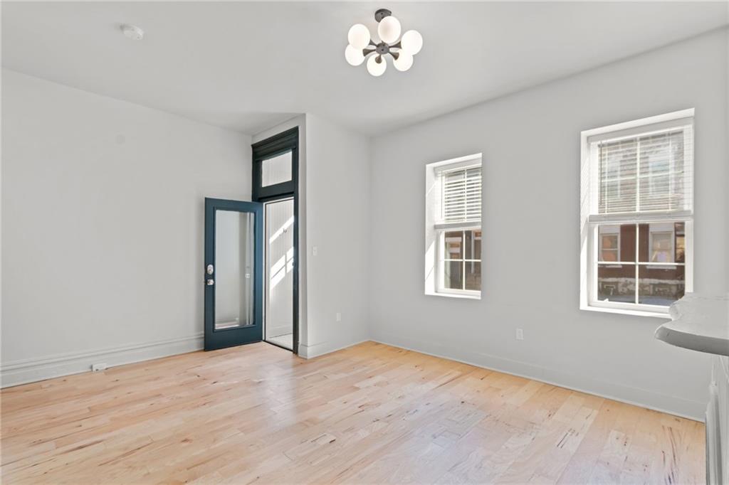 2011 Forbes Avenue Pittsburgh, PA 15219 - Photo 5 of 41 a view of an empty room with a window