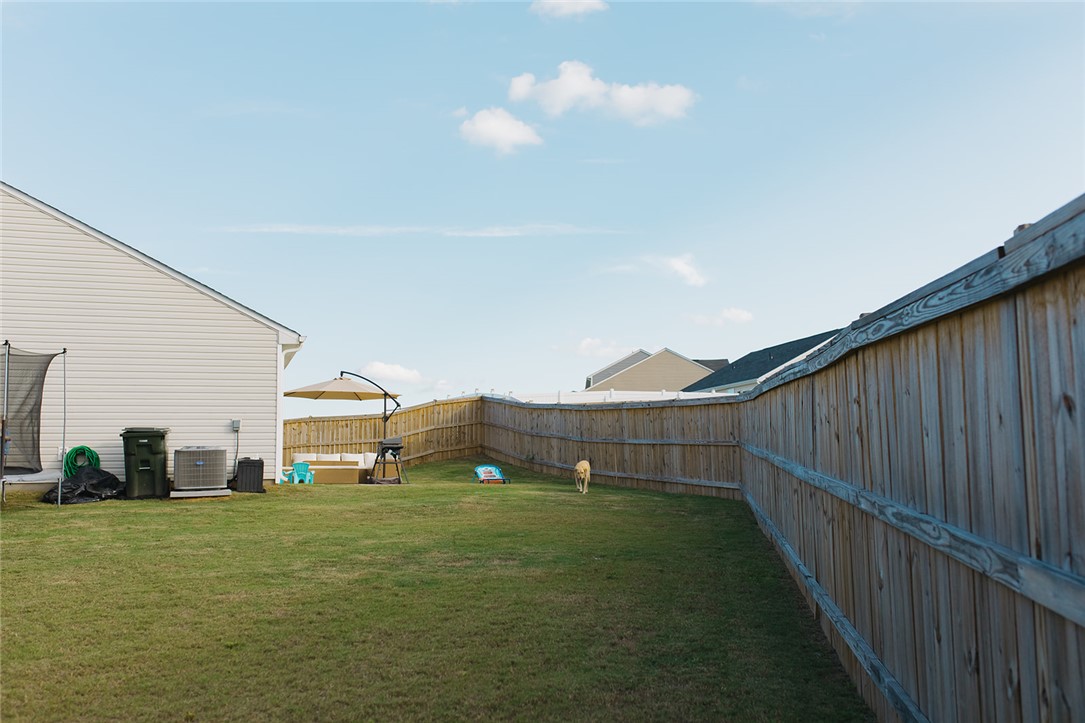 314 Callie Way Easley, SC 29642 - Photo 26 of 27 This spacious grassy yard offers ample room for outdoor activities and relaxation.