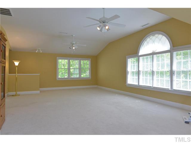 11024 Brass Kettle Road Raleigh, NC 27614 - Photo 19 of 25 a view of an empty room with a window