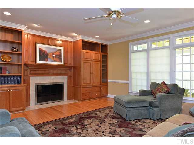 11024 Brass Kettle Road Raleigh, NC 27614 - Photo 6 of 25 a living room with furniture and a fireplace